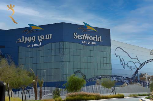 a sea world building with a sign on it at Elegant 2BR Golf View Oasis in Yas Island - Maids Room, Pool & Near Yas Mall in Yas Island