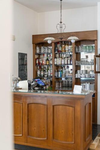 a bar in a kitchen with a counter at Agriturismo B&B La Sterpina in SantʼArcangelo