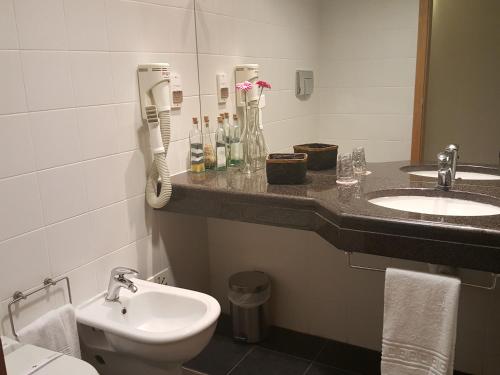 Um banheiro em Hotel Jose Alberto