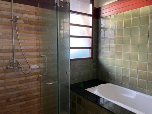 Bilik mandi di Blue Beach Apartment