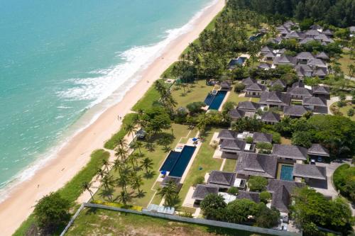 an aerial view of a resort next to the beach at Villa Ananda at Jivana Beach Villas in Pilai Beach