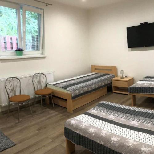 Ένα ή περισσότερα κρεβάτια σε δωμάτιο στο Apartmán u Slávky