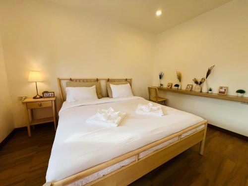 Ένα ή περισσότερα κρεβάτια σε δωμάτιο στο I-Lay House Koh Kood