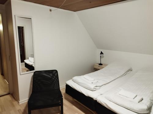 Postel nebo postele na pokoji v ubytování Fjeldgaard - Aarup