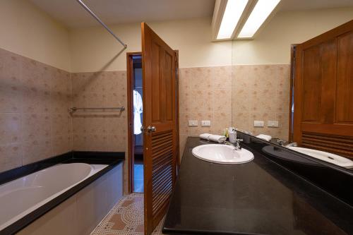 Bilik mandi di Blue Beach Apartment