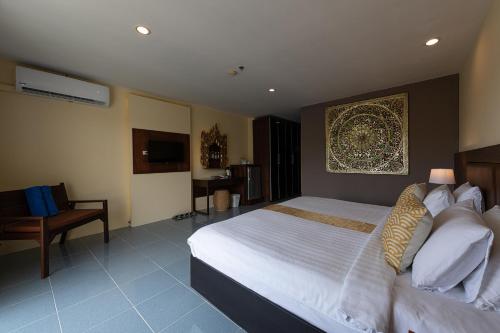 Katil atau katil-katil dalam bilik di Blue Beach Apartment