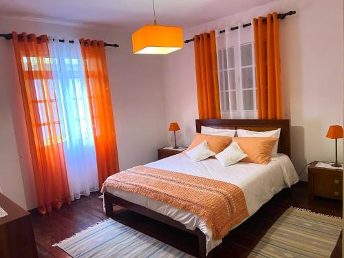 Postel nebo postele na pokoji v ubytování Vale dos Passarinhos