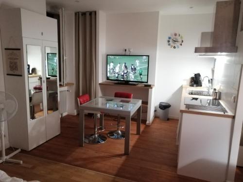 Studio dans maison de ville