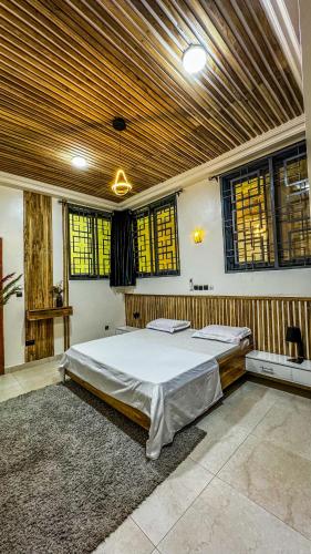 Llit o llits en una habitació de Luxury Suites