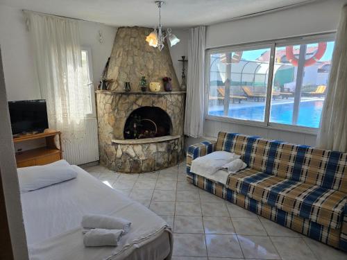 Ένα ή περισσότερα κρεβάτια σε δωμάτιο στο California Apart Otel