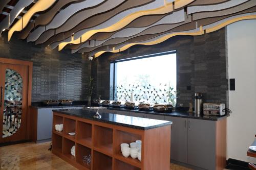 Η κουζίνα ή μικρή κουζίνα στο The Citi Residenci Hotel, Banskopa