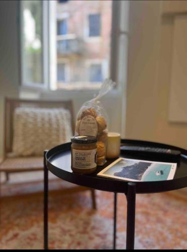 a table with jars of food on top of it at Charmant appartement Olmeto in Olmeto