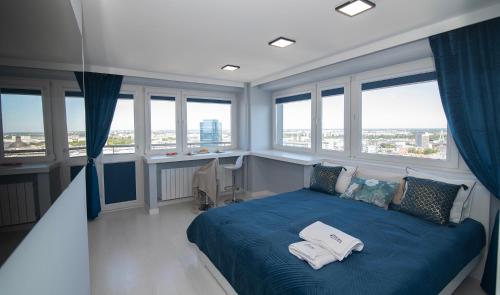 Posteľ alebo postele v izbe v ubytovaní WLR Apartments - Chmielna I