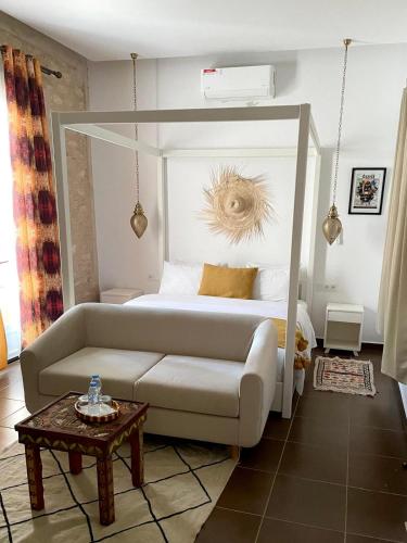 Una cama o camas en una habitación de Riad SABIDI