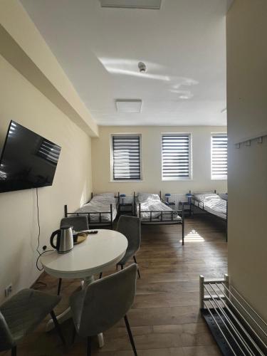 Ένα ή περισσότερα κρεβάτια σε δωμάτιο στο Hotel Towarowa 24