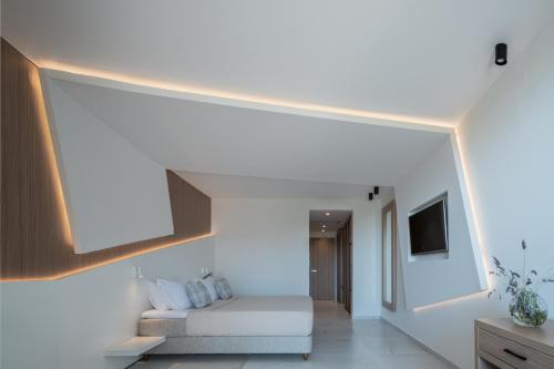 Kassandra Bay Resort, Suites & Spaにあるテレビまたはエンターテインメントセンター