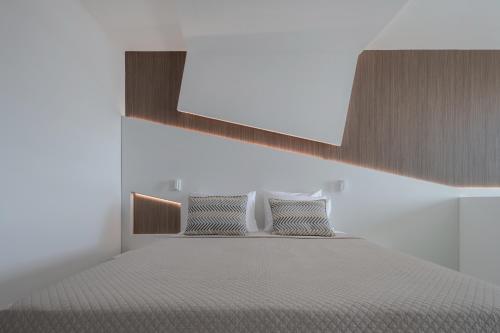 Kassandra Bay Resort, Suites & Spaにあるベッド