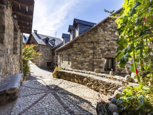 an alley in an old stone building at Apartment Casita Alba by Interhome in Taull