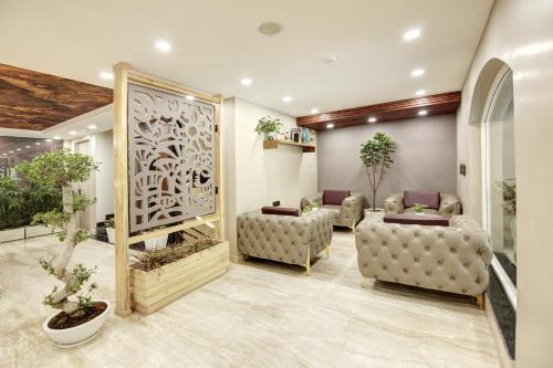 Χώρος καθιστικού στο Hotel 91 Millennium Huda