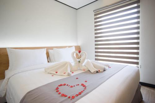 Ένα ή περισσότερα κρεβάτια σε δωμάτιο στο Allstay Ecotel Yogyakarta