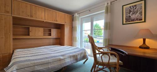 Postel nebo postele na pokoji v ubytování Ferienwohnung LFR18 Brise