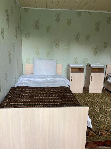 Postel nebo postele na pokoji v ubytování Happy Family Guest House