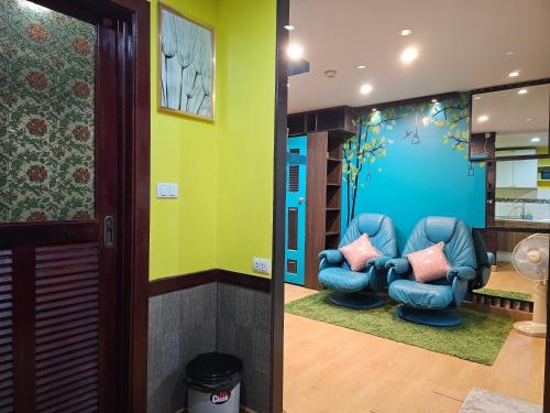 Ruang duduk di Plus 2 Condo Phuket by ABCD