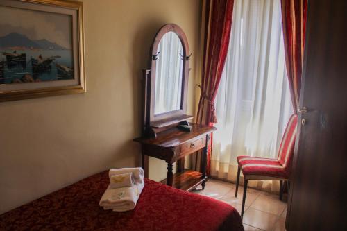 Postel nebo postele na pokoji v ubytování Hotel Sicilia