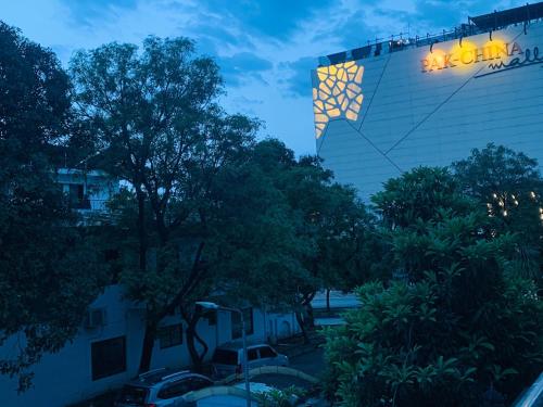 a kite is flying in front of a building at Istanbul Inn in Islamabad