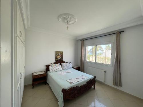 Postel nebo postele na pokoji v ubytování Appartement Monaco