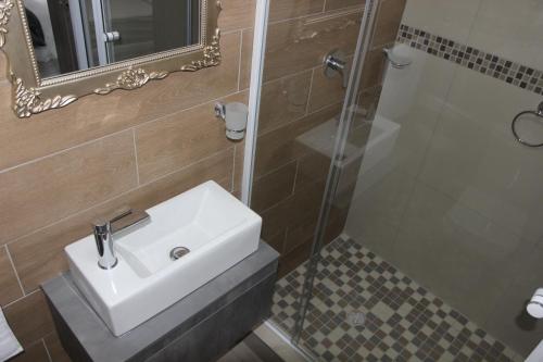 Ванная комната в Golden View Boutique Guesthouse