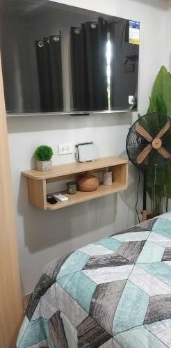 Postel nebo postele na pokoji v ubytování La Freya Suite Tagaytay