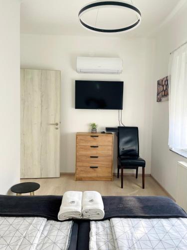 Lator Apartmanházにあるベッド