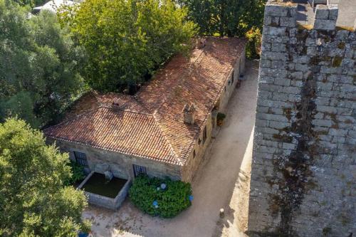an aerial view of a house with a roof at Casa Dom Mendo in Refoios do Lima
