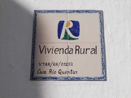 a sign for arizona rival on a wall at Casa El Rincón de Trini & Jose in Quéntar
