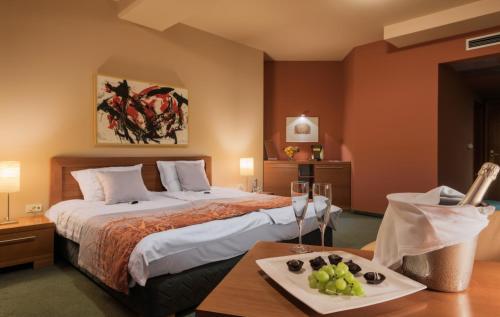 Postel nebo postele na pokoji v ubytování Hotel Arka