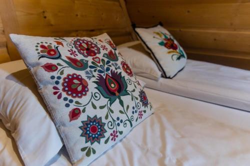 Postel nebo postele na pokoji v ubytování Domek Krupówki z widokiem na Giewont