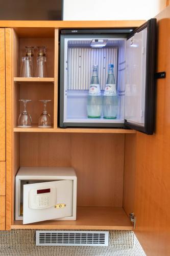 Best Western Premier Airporthotel Berlinにあるキッチンまたは簡易キッチン