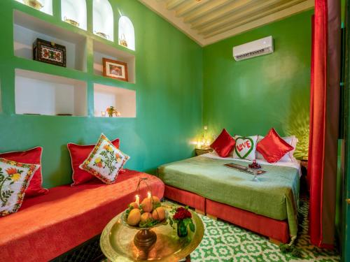 Letto o letti in una camera di Riad dada Messouda spa