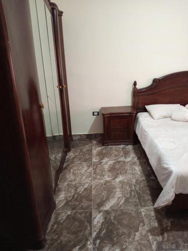 Postel nebo postele na pokoji v ubytování الشقة العائلية الحديثة familial new flat