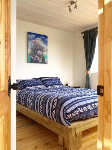Katil atau katil-katil dalam bilik di Pichilemuhostel SurfersView