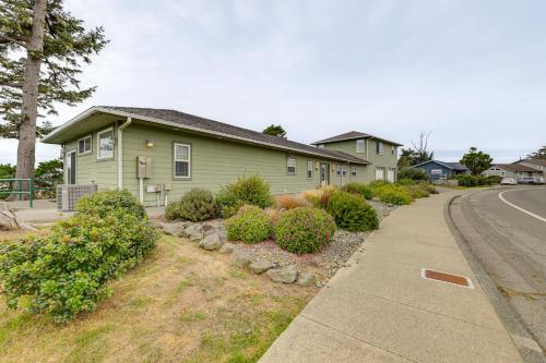 a house on the side of a road with bushes at Crescent City Getaway with Panoramic Ocean Views! in Crescent City