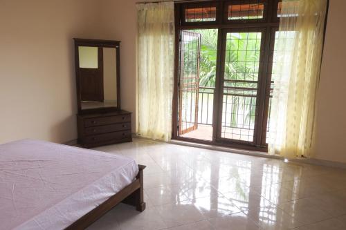 Cama o camas de una habitación en Riverview Kandy