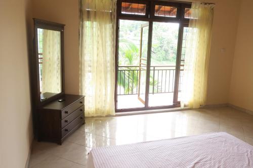 Cama o camas de una habitación en Riverview Kandy