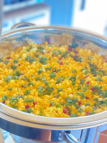 a pot of food with peas and other ingrediants at Deck Pousada in Carolina