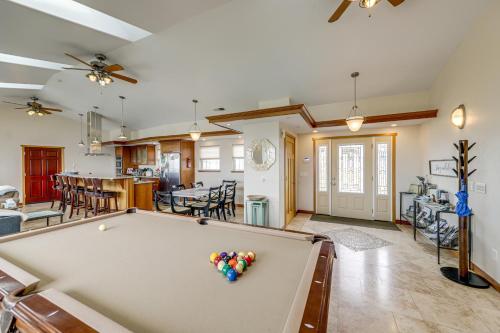 a pool table in the middle of a living room at Crescent City Getaway with Panoramic Ocean Views! in Crescent City