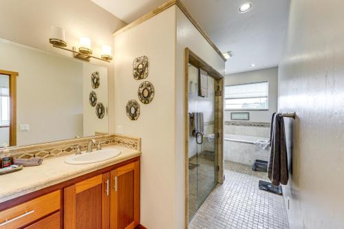 a bathroom with a sink and a shower at Crescent City Getaway with Panoramic Ocean Views! in Crescent City