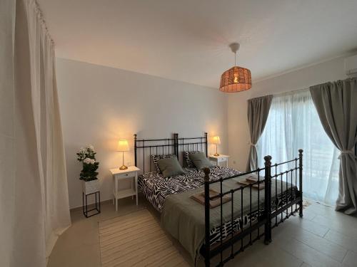 Postel nebo postele na pokoji v ubytování CASA VERDE con vista al mar