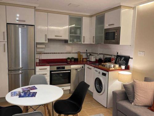 Η κουζίνα ή μικρή κουζίνα στο Rincón acogedor descubre la ciudad