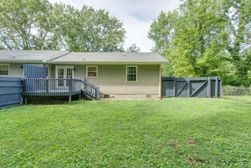 a house with a fence in a yard at Sunset Stay Pet Friendly 2bed 1 bath in Murfreesboro